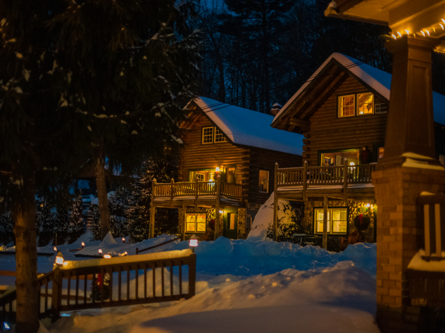 Night time, snowy view of Ethan Allen and Lord Howe from walkway