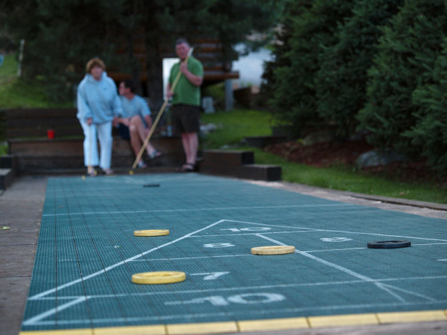 Guests playing shuffleboard