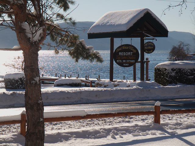 Sun shining on lake and snow
