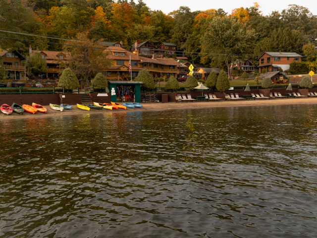 Beach and resort from the lake in early fall